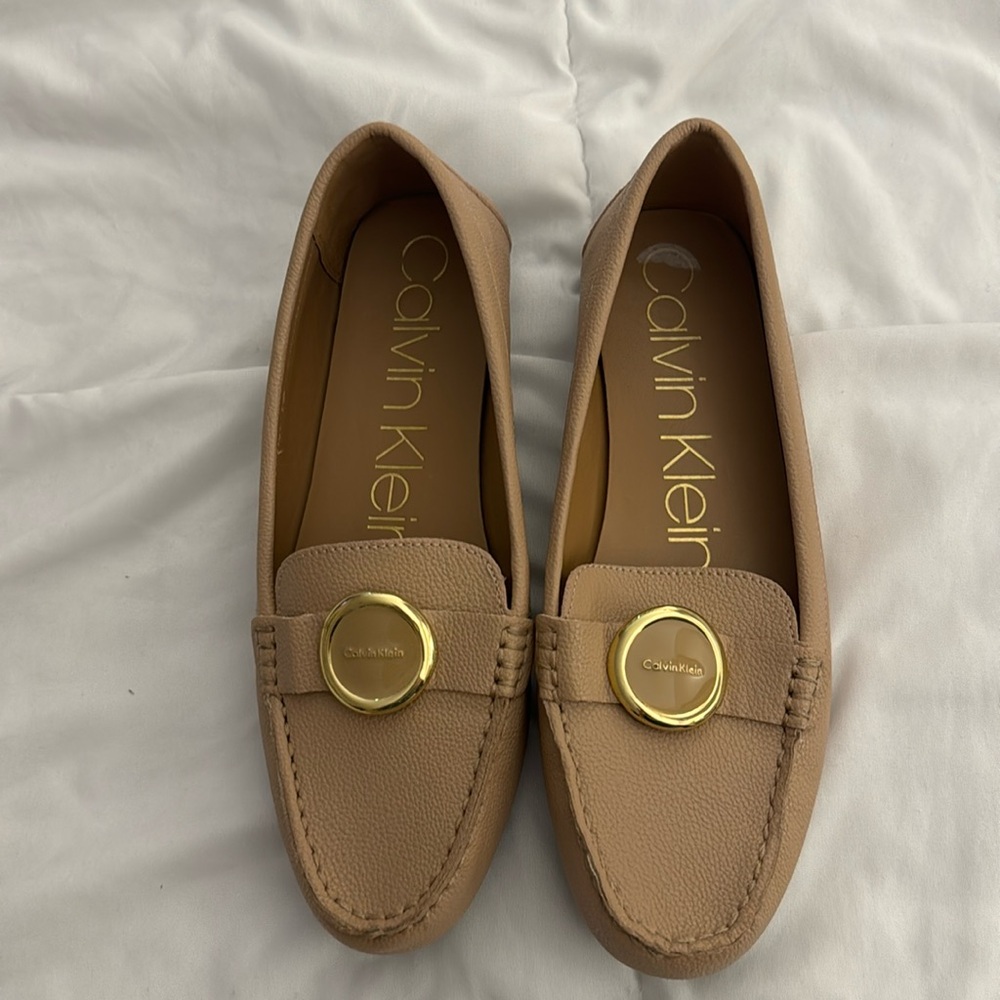Calvin Klein Flats. Size 9. Worn once. Light pink neutral color. Leather.